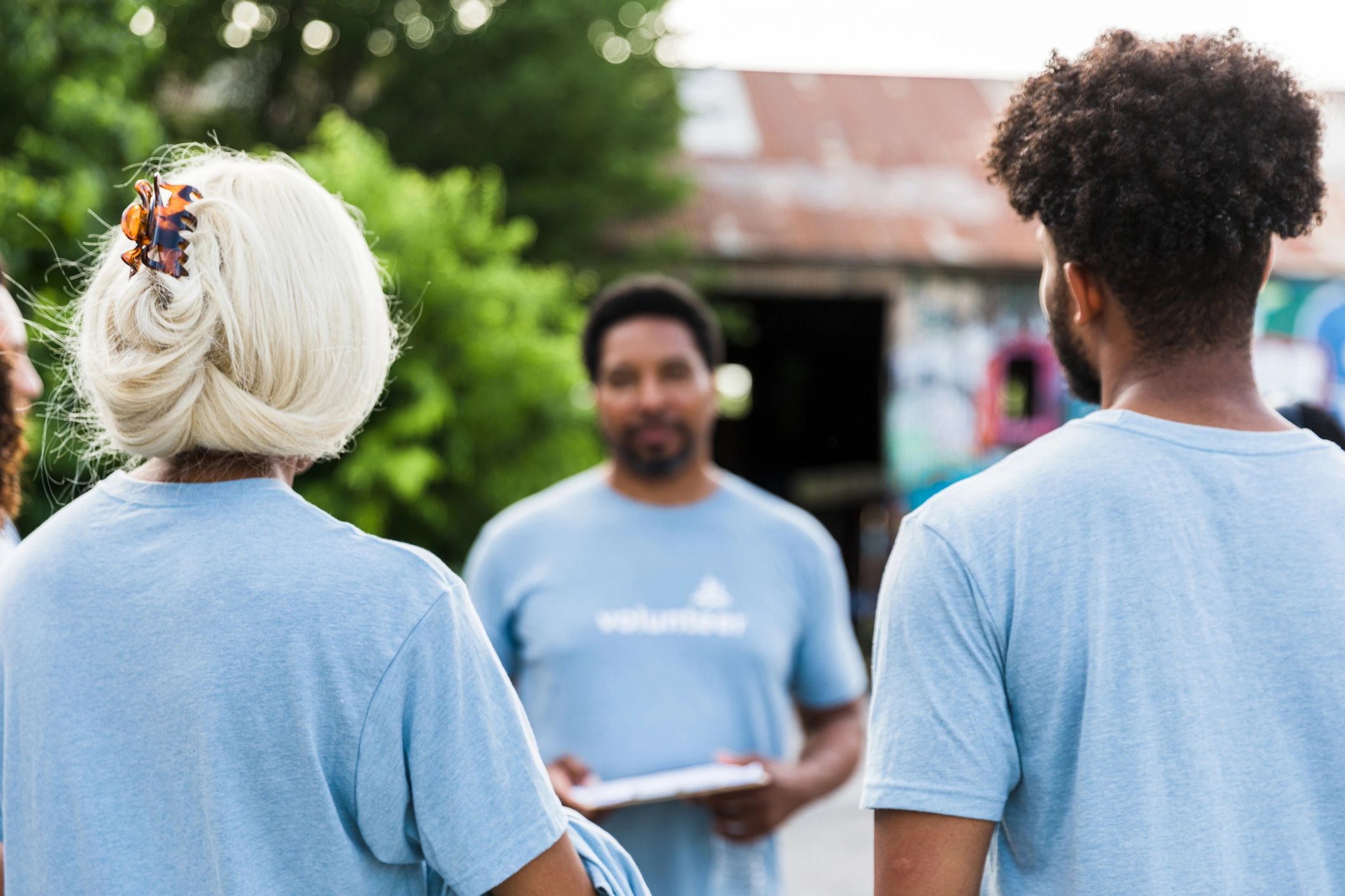 Volunteers listening during a community event