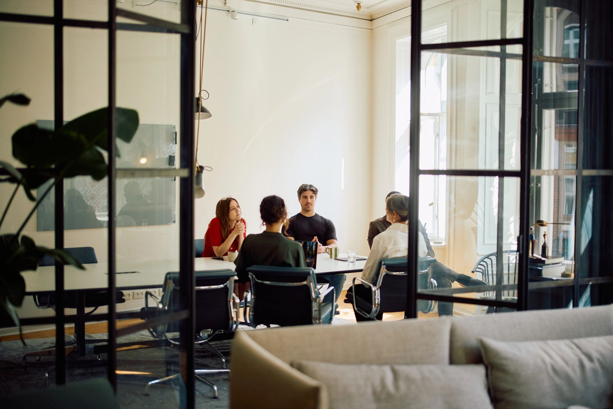 Community partners collaborating around a meeting table